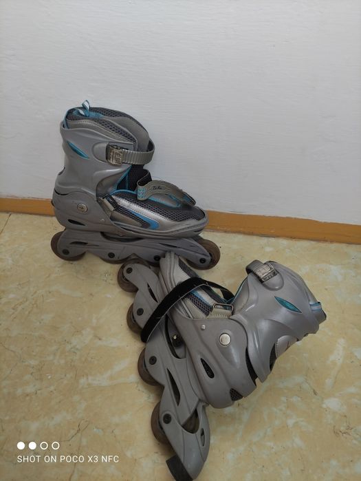 Роликовые коньки