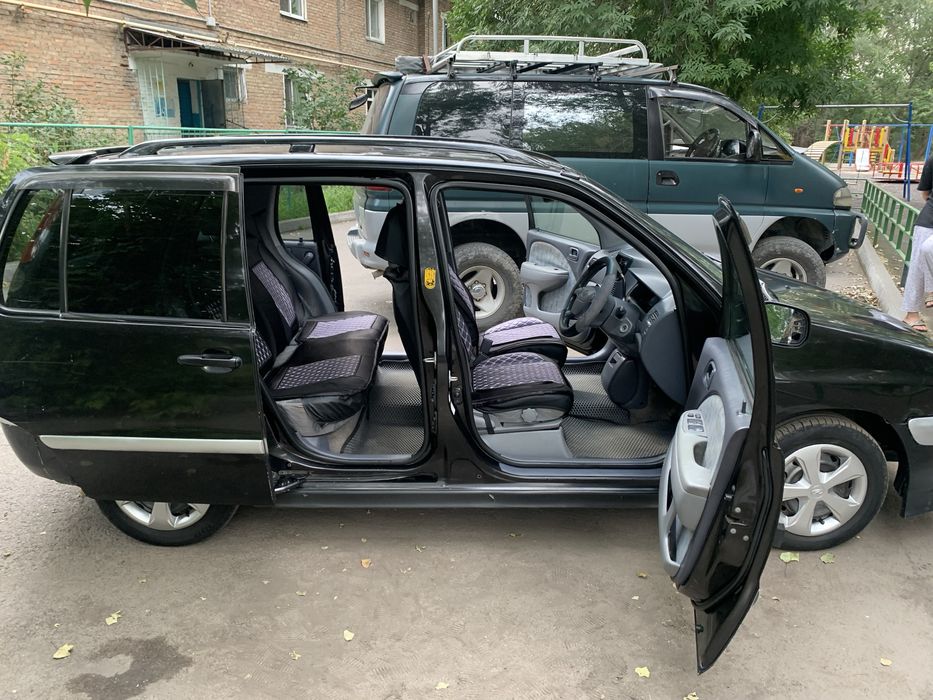 Тайота Раум 1997 года