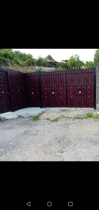 Ворота кованные  из толстого металла.