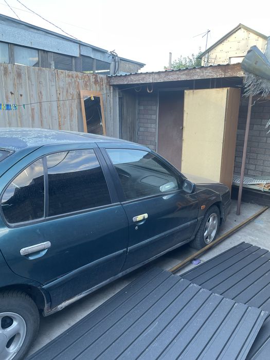 Nissan primera 96 год
