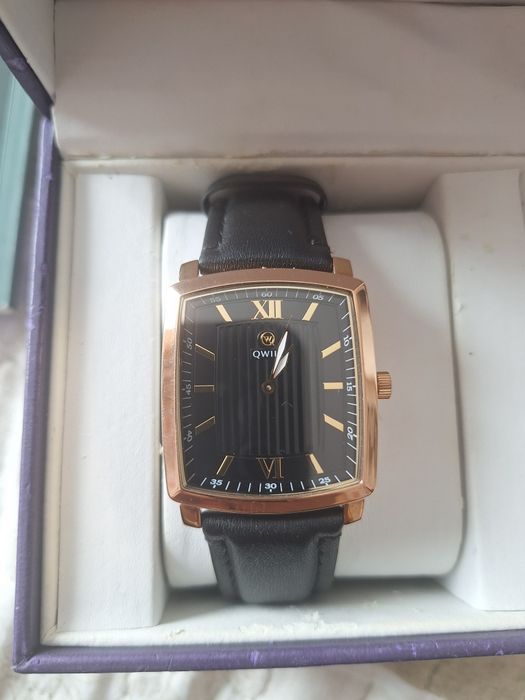 Золотые часы Qwill