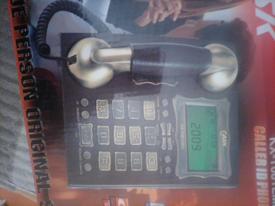 Продам стационарный телефон за 50 000...или обменяю на шоколадку Milky