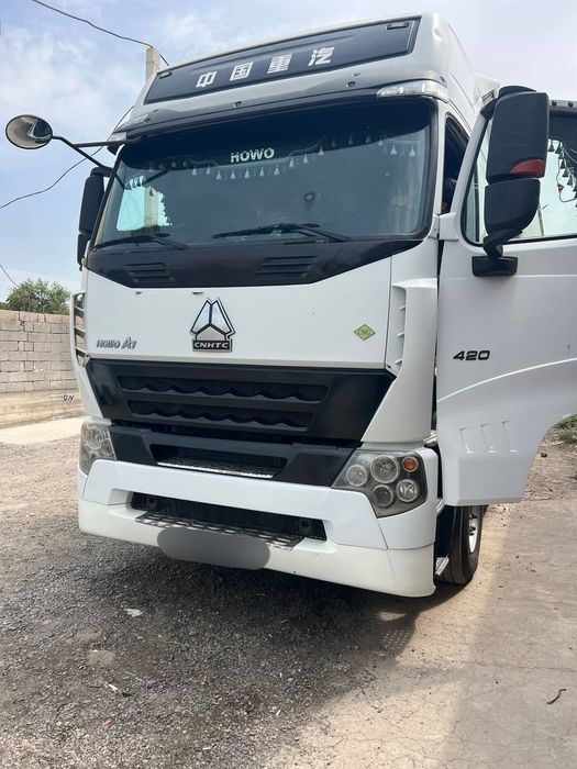 HOWO A7 +KRONE pritsep