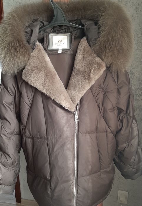 Продам пуховик б/у