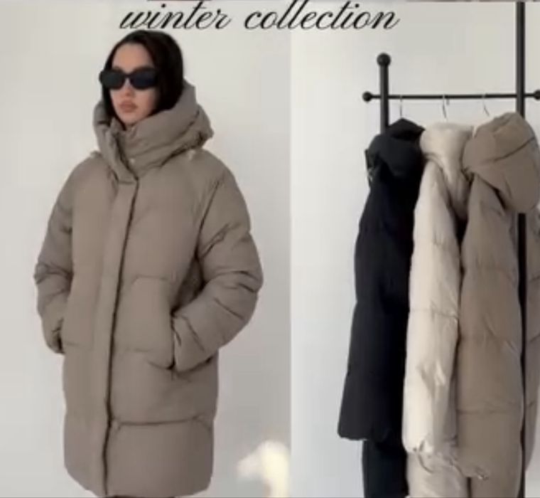 Продам пуховик куртку 52.000