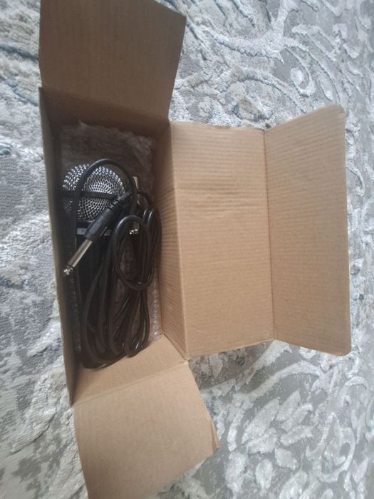 Продается микрофон проводной новый