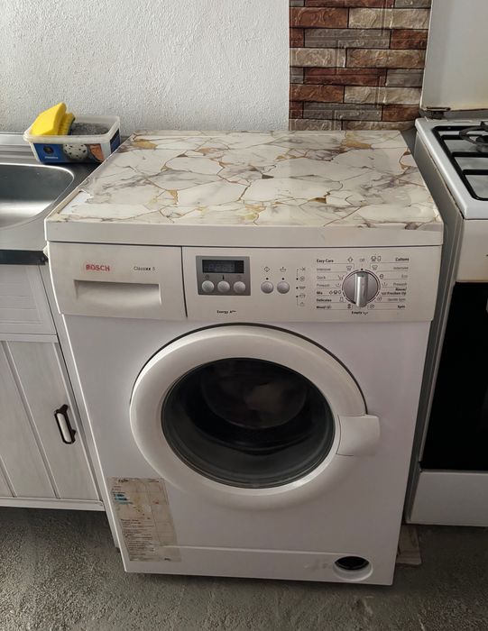 Mașină de spălat