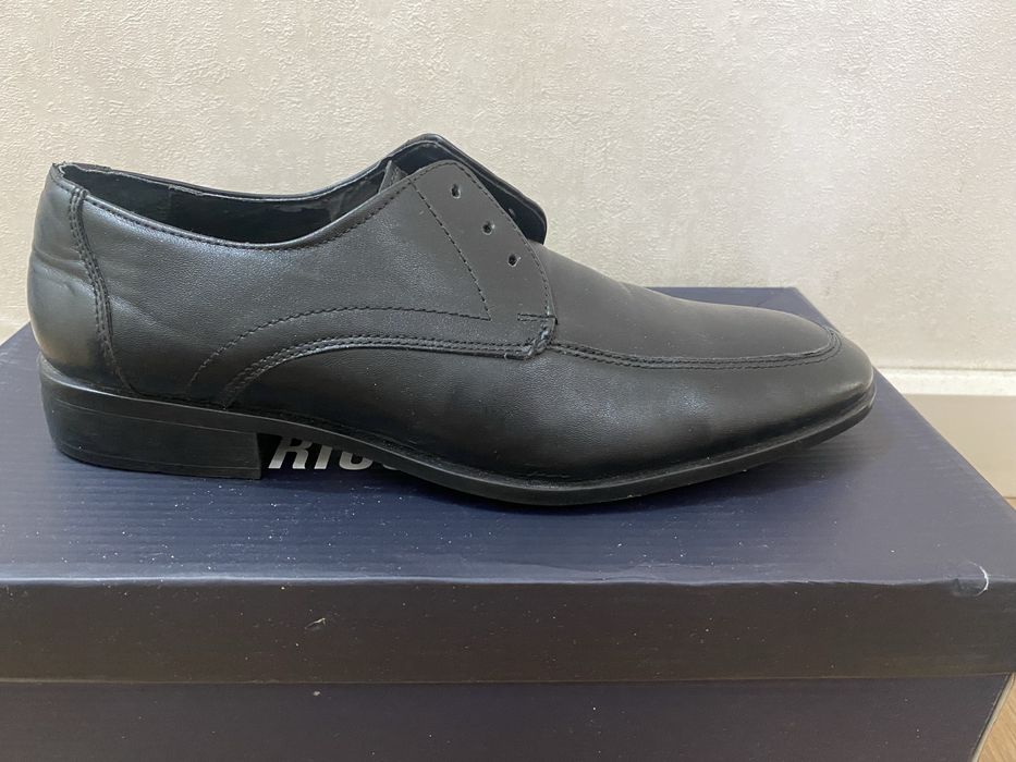 Новые туфли кожанные