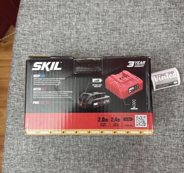 Masina de insurubat cu impact Skil cu acumulator&incarcator 20 V, 2 Ah