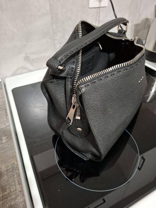 Продам новую кожаную сумку Basconi