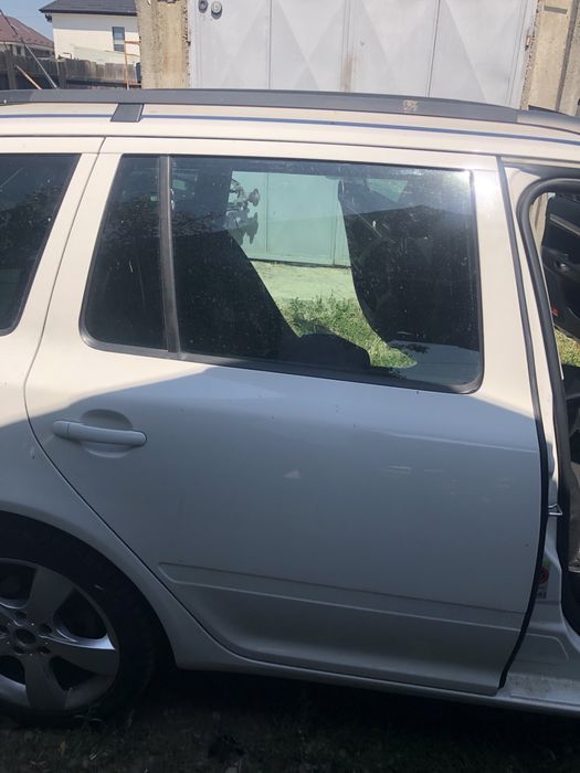 Usa portiera dreapta alb Skoda Octavia 2 facelift 1.6 BSE oglinda 2010