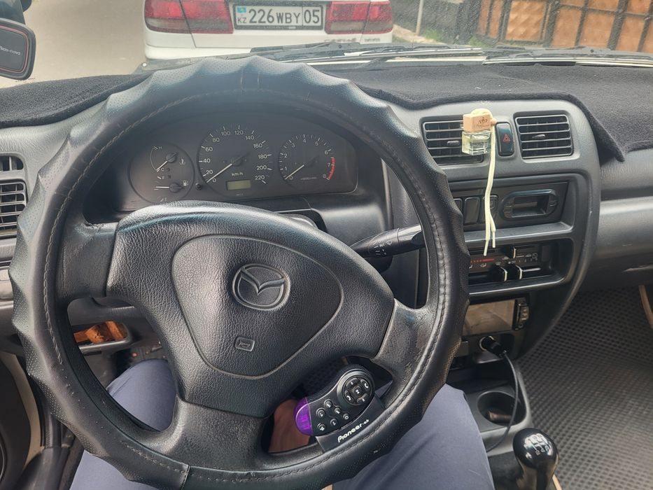 Мазда 323 Фамила