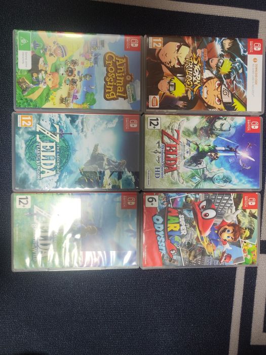Nintendo switch lite + 8 игр