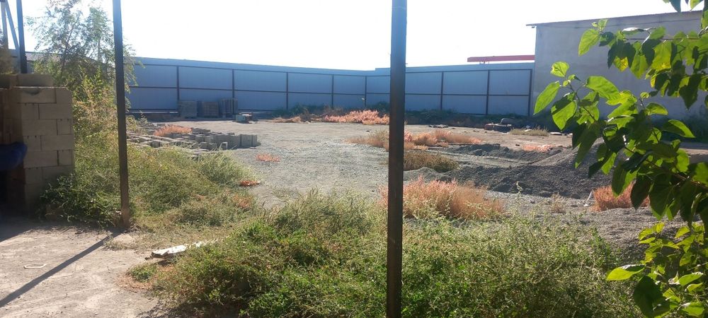 Урганч шахарда ишлаб чикаришга мулжалланган бино ва 20 сотик ер майдон