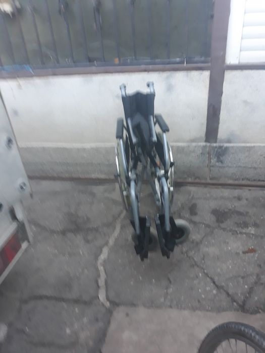 Carucior handicap  scaun cu rotle