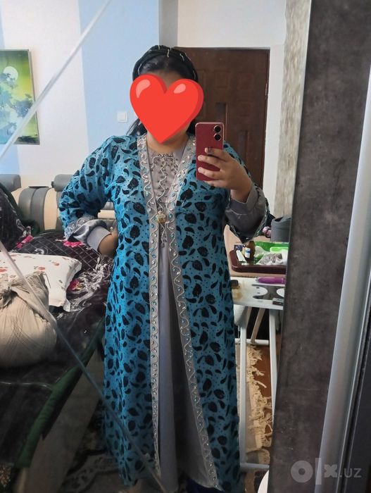 Munchoqlari qul bilan tikilgan abaya