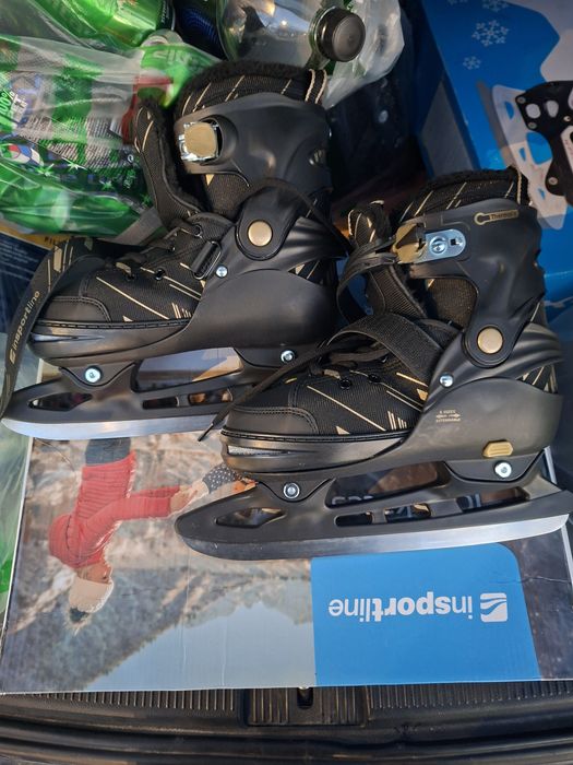 Vand patine unisex Insportline .Patinele sunt reglabile marimea 37--41