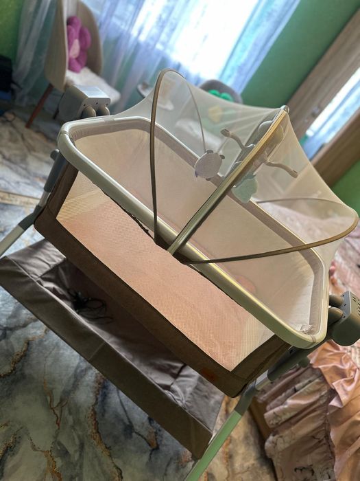 Pătuț electric cu balansoar