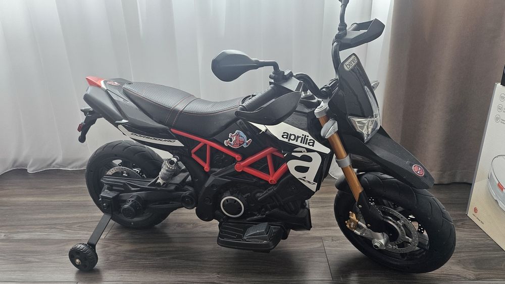 Motor cu roti ajutatoare pentru copii