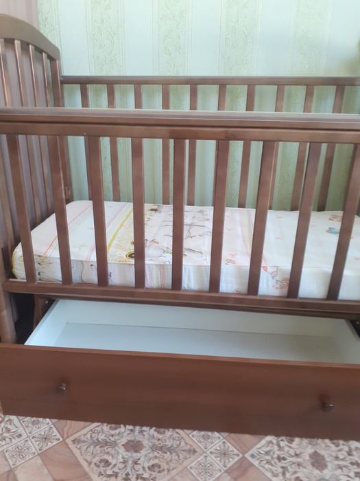 Детская кроватка маятник