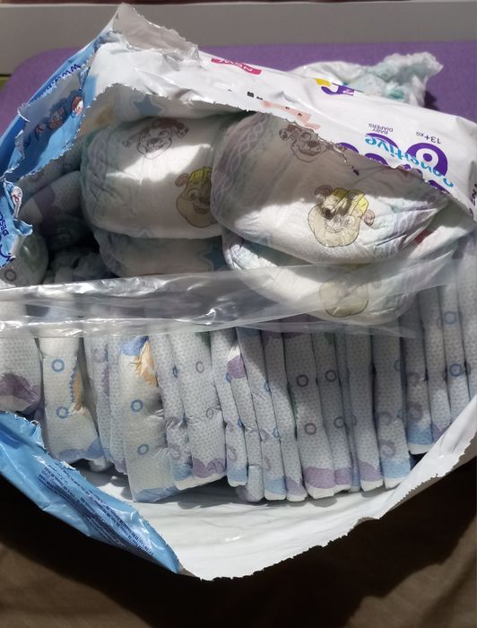 Памперси пуфис и памперс 6