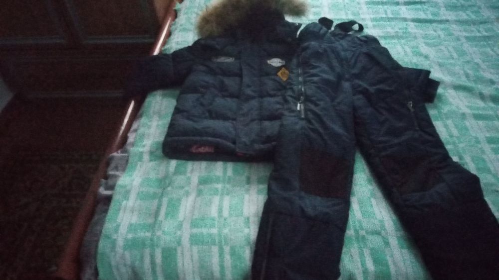 Продам детский комбинезон  с курткой для мальчика 6-7 лет в