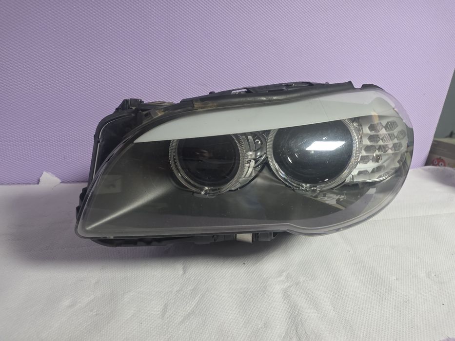 Far stanga BMW Seria 5 F10 F11 Bi-Xenon LED original HELLA 7203245