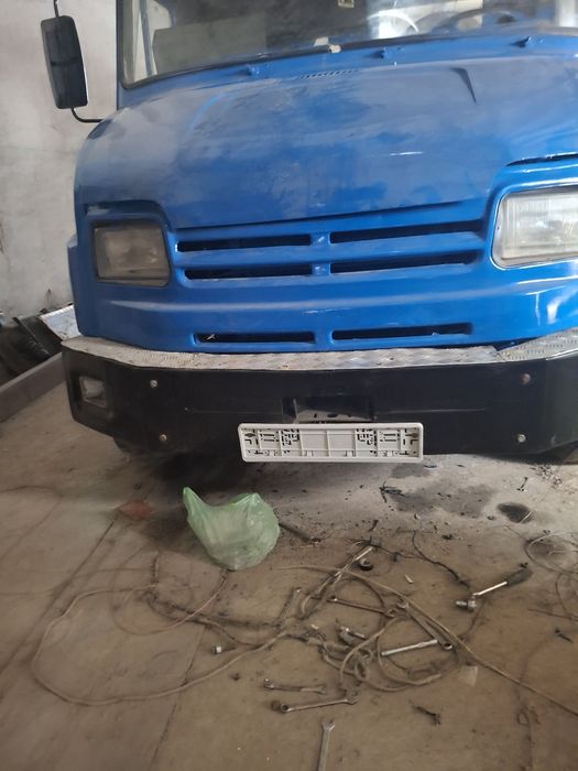 Манипулятор эвакуатор зил бычок