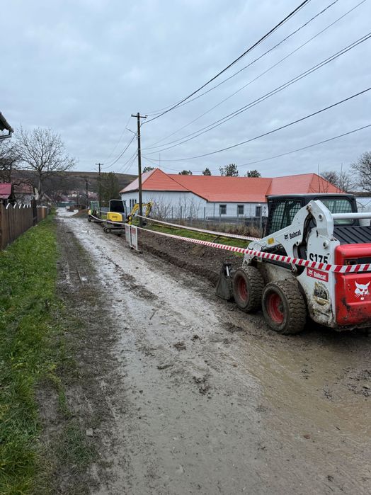 Închiriez miniexcavator / transport basculabil excavator