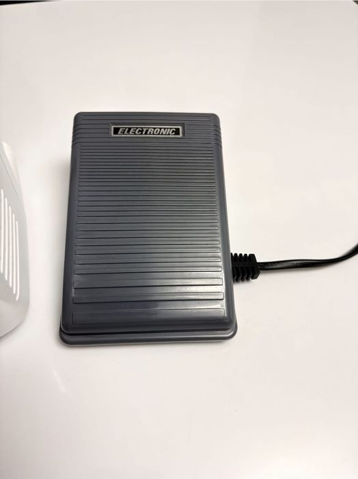 Mașina de cusut oferta