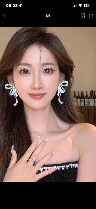 Продам серьги бантик