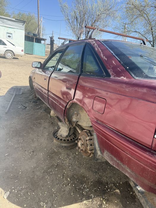 Легковые автомобили Мазда 626