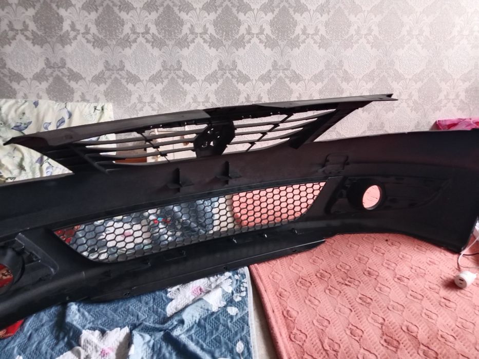 Бампер рено логан