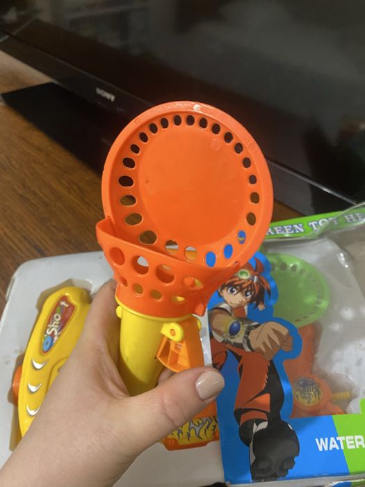 Игрушка пистолет