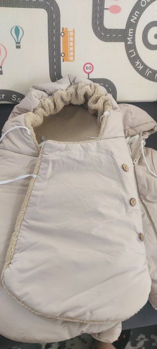 Продам манеж и комбинезон детский .