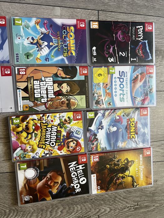 Nintendo Switch OLED (Пълен комплект) + Pro Контролер + 10 Игри + Калъф