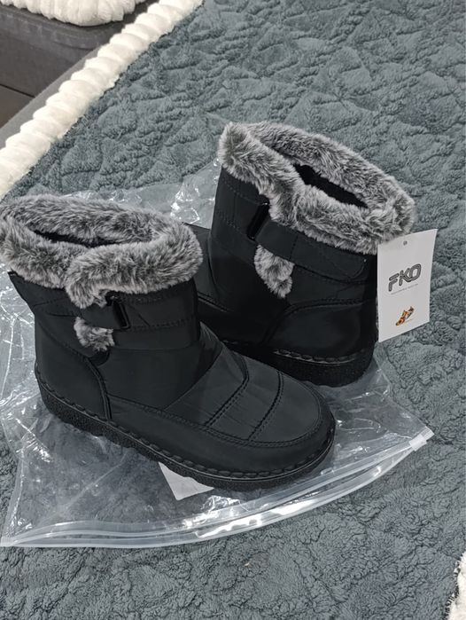 Продам новые сапоги