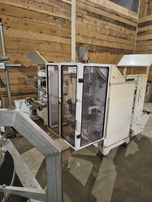 Флоупак пакетиращи машини Simionato 2 броя с мулти глава 16 глави