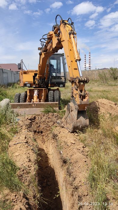 Продам срочно колесный экскаватор