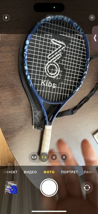 Теннисная ракетка