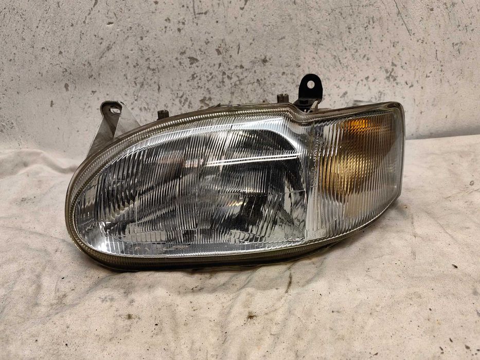 Оригинален фар Форд  Ford Escort 97-2000