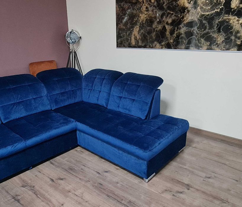 Син П образен ъглов диван от плат Nigrum с функция сън