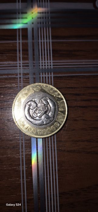 Продам монету 100тг