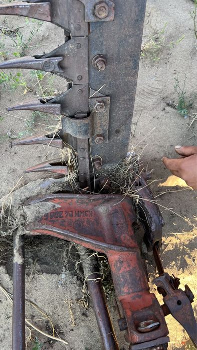 Косилка трехбрусная.