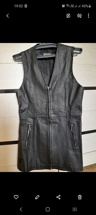 Кожанная жилетка .