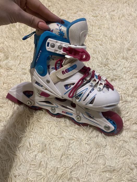 Роликовые коньки