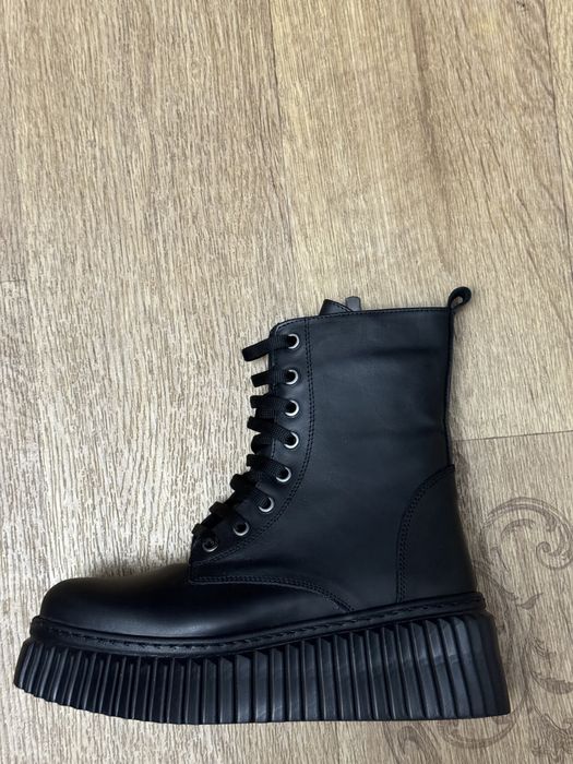 Продам новые женские сапоги