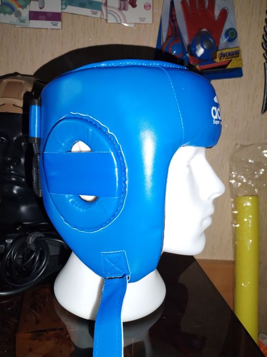 Шлем защитный для спортивных единоборств. Новые