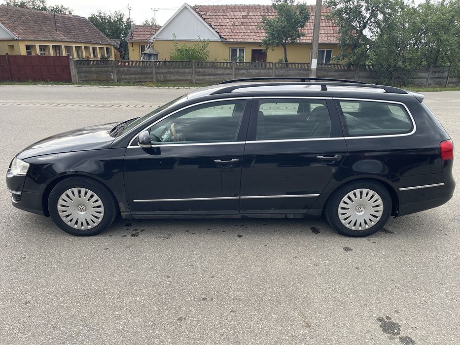 VW Passat B6 + două seturi de anvelope de iarnă (8 bucăți)
