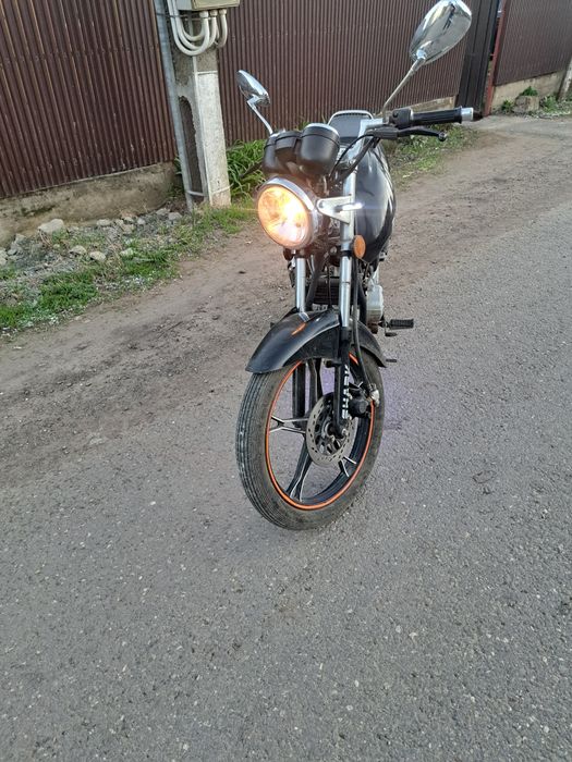 Motor 125 merge perfect arata ca in pozze